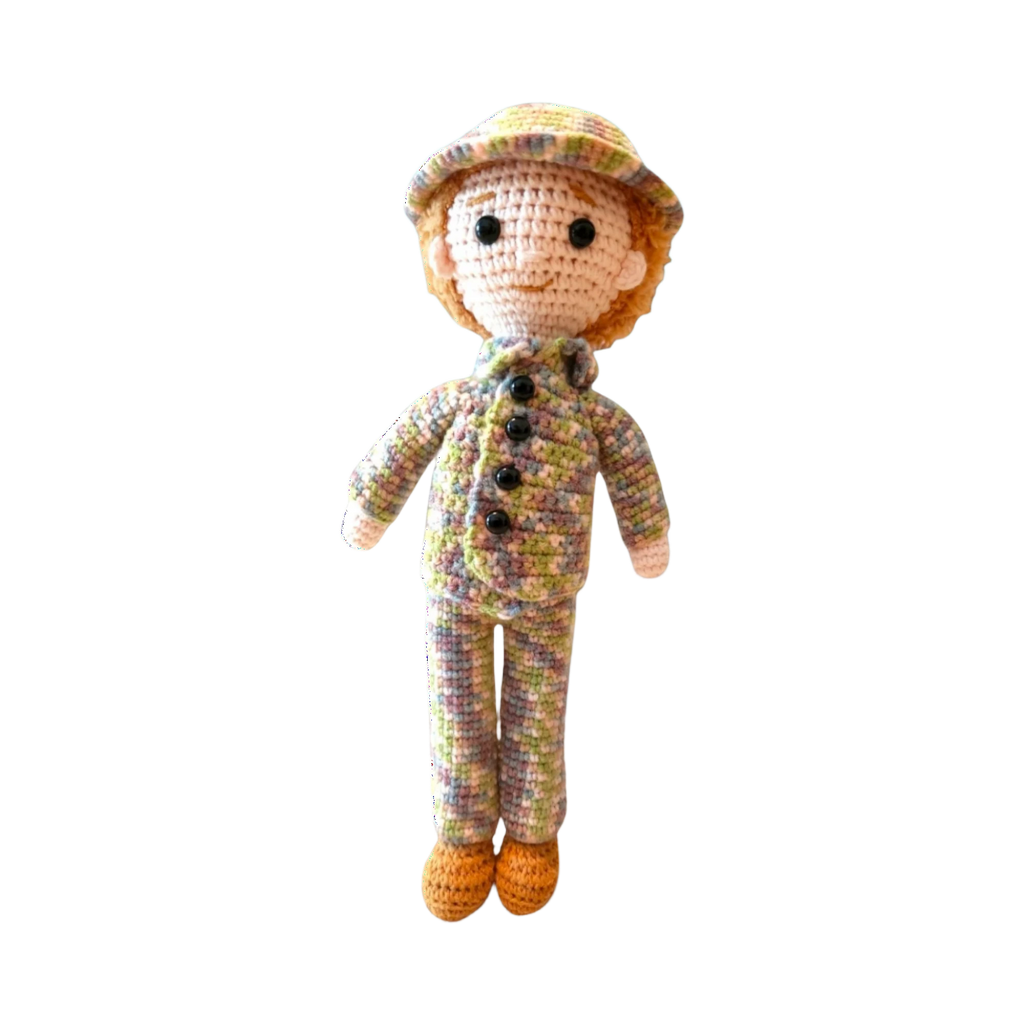 Suzie's Sunshine Dolls Army doll in a multicolour crocheted camouflage uniform and hat, with orange shoes.