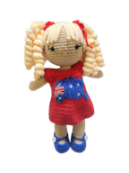 Suzie's Sunshine Dolls Mia, a crocheted doll with long blonde curly hair, wearing a red dress with the Australian flag and map appliqué, and blue shoes.