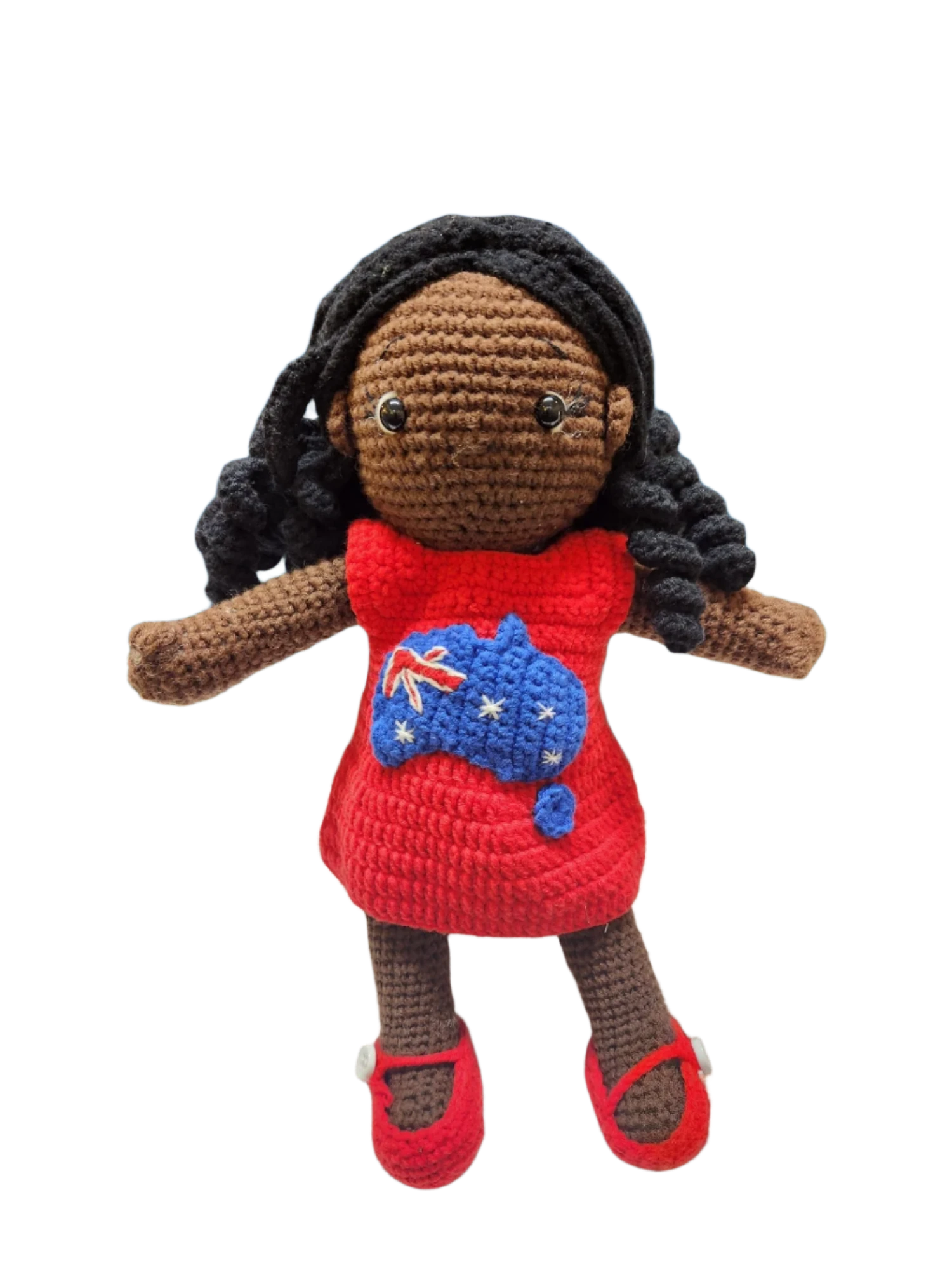 Suzie's Sunshine Dolls Mia, a crocheted doll with long black hair, wearing a red dress with the Australian flag and map appliqué.
