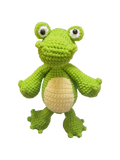 Suzie's Sunshine Dolls Cassius the Croc, a handmade green yarn stuffed toy with a cream belly and big white-rimmed eyes.