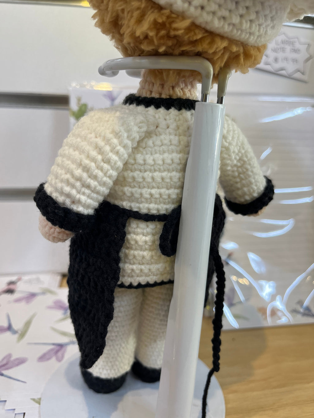 Suzie's Sunshine Dolls handcrafted crochet chef doll in white uniform with black apron and hat. Approx 30cm.