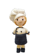 Suzie's Sunshine Dolls handcrafted crochet chef doll in white hat and uniform with black apron, 30cm tall.