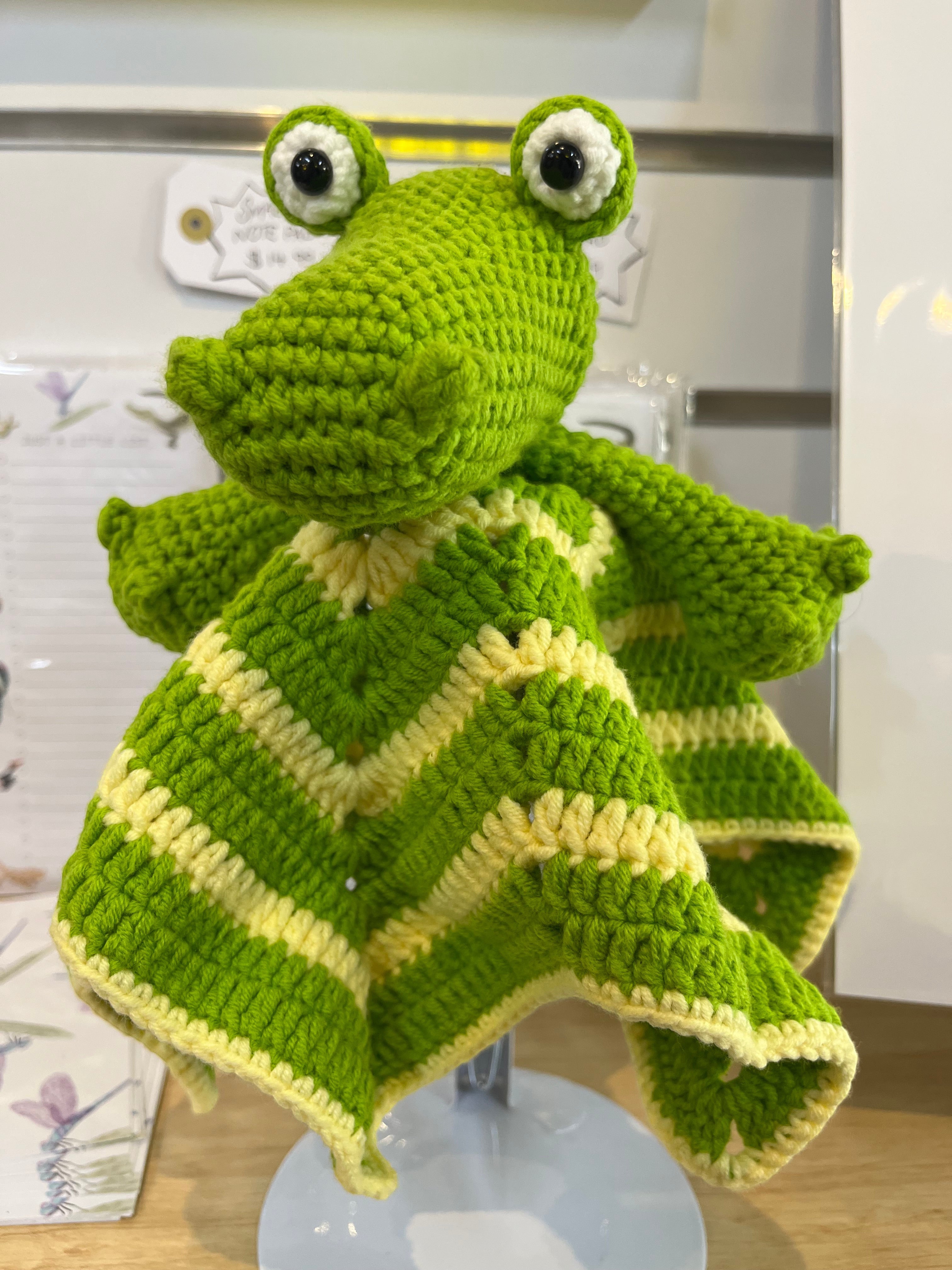 Suzie's Sunshine Dolls Kasabian the Croc lovey blanket, green and cream striped crochet with button eyes.