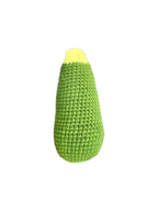 Suzie's Sunshine Dolls hand-crocheted avocado toy made of green and yellow cotton yarn.