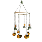 Suzie's Sunshine Dolls handmade crochet baby crib mobile with bees and flowers. Yellow and black bees with white wings, white flowers with yellow centers, and green leaves.