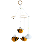Suzie's Sunshine Dolls handmade crochet baby crib mobile with bees and clouds, yellow, black, and white yarn
