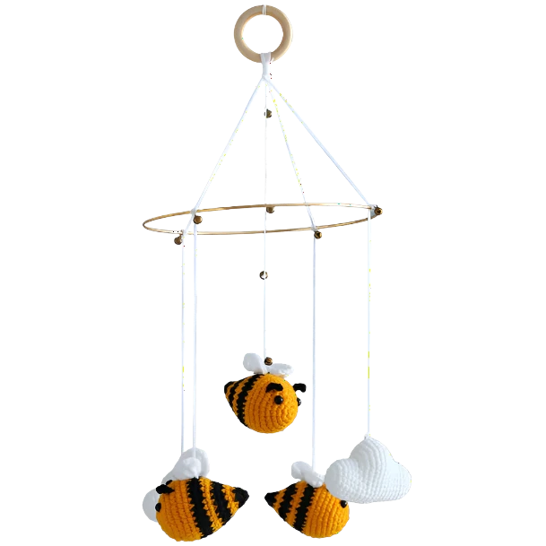 Suzie's Sunshine Dolls handmade crochet baby crib mobile with bees and clouds, yellow, black, and white yarn