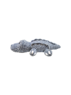 Suzie's Sunshine Dolls Kurtis the Croc, a soft grey crocheted crocodile plush toy with white toes and stitched smile.