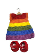 Suzie's Sunshine Dolls handmade crochet rainbow striped doll dress on hanger with red booties. Soft yarn.