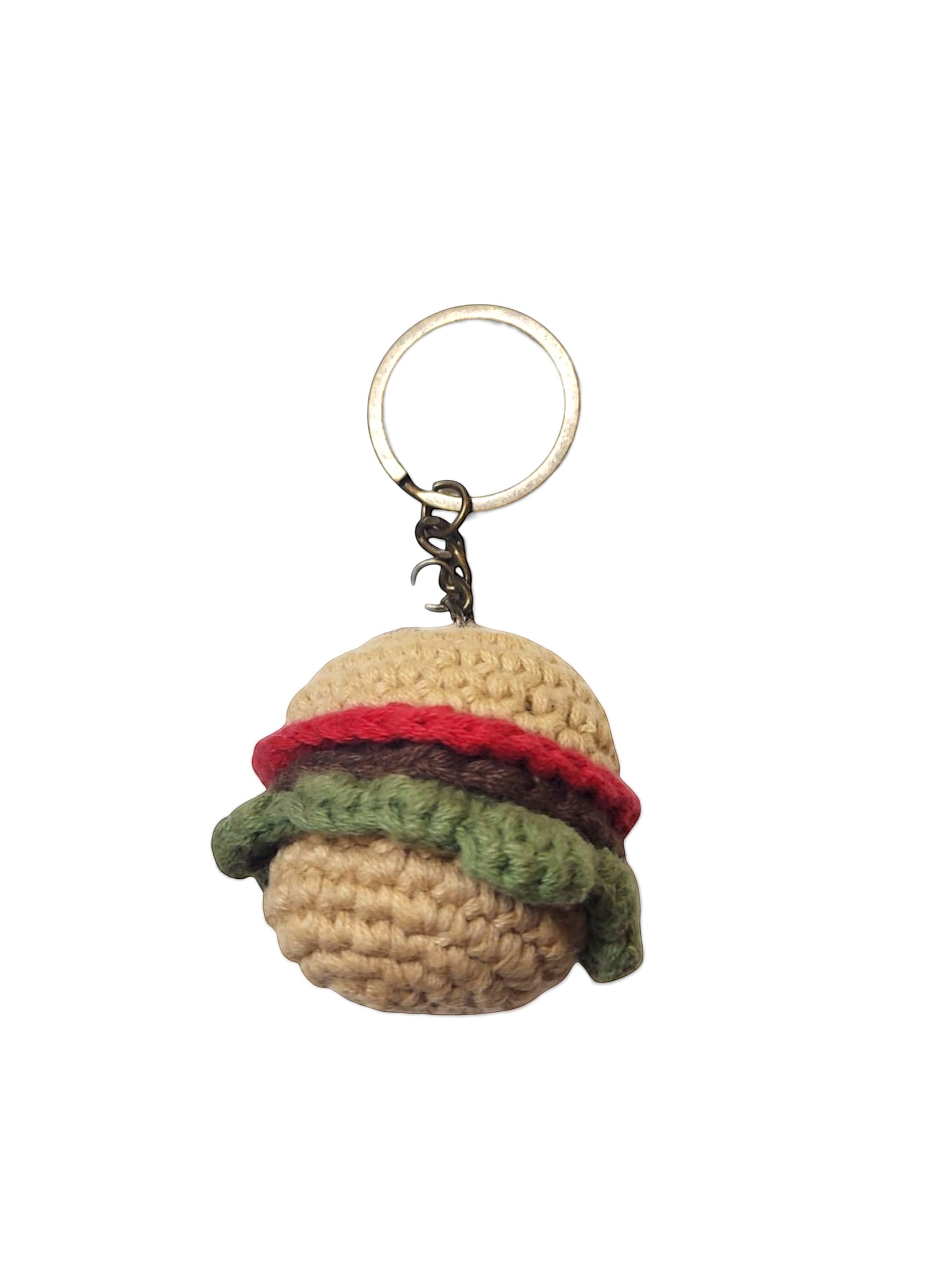 Suzie's Sunshine Dolls handmade crochet keychain shaped like a hamburger with tan bun, red tomato, brown patty, and green lettuce.