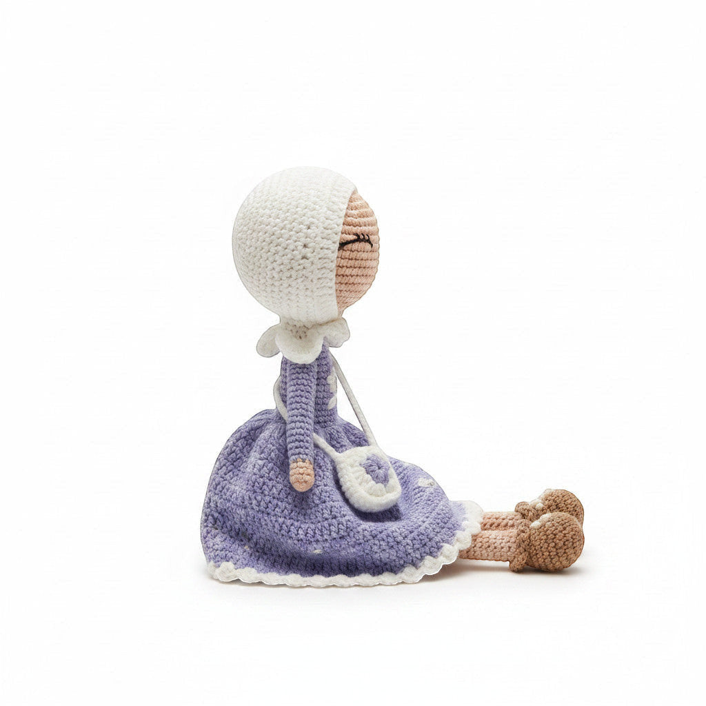 Suzie's Sunshine Dolls handmade crochet doll in purple dress with white hijab and purse, 8-10 inches tall.