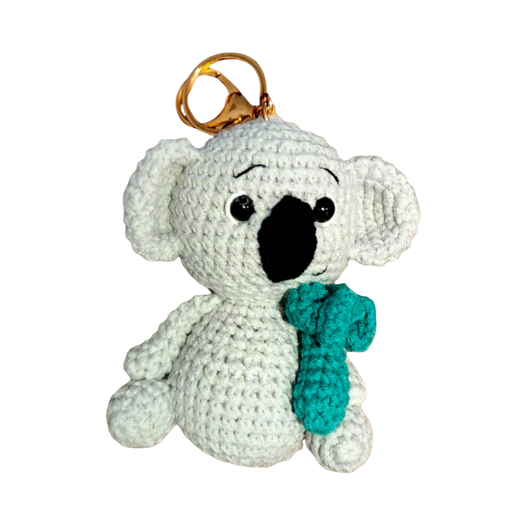 Suzie's Sunshine Dolls handmade light grey crochet koala keychain with teal scarf and gold keyring.
