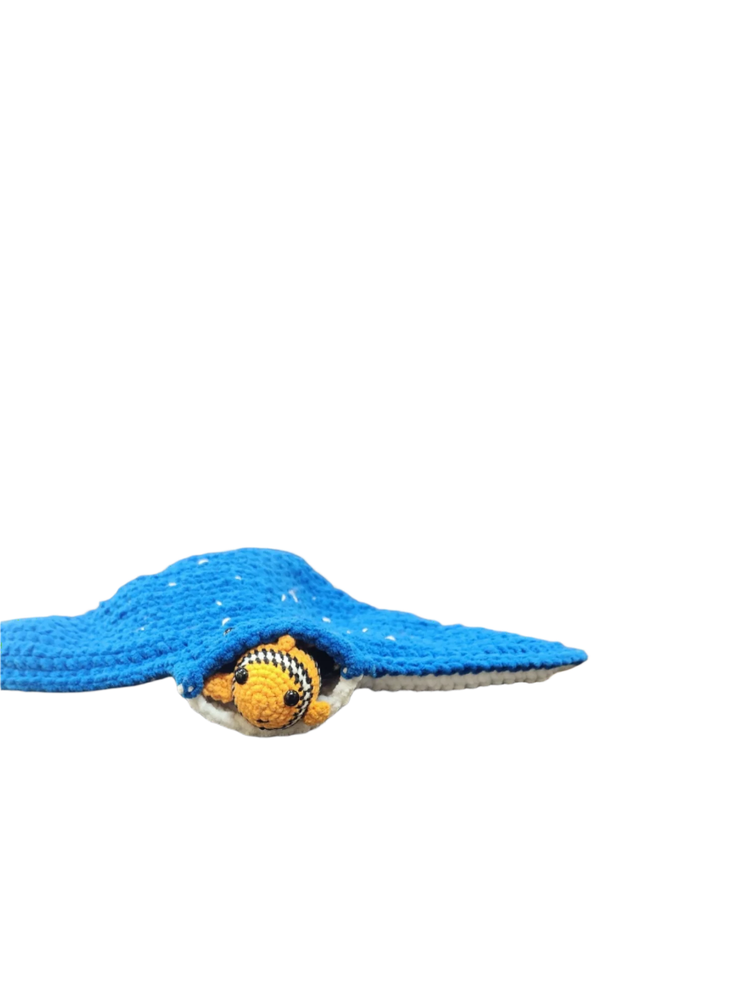 Suzie's Sunshine Dolls Morris the Mantaray crochet toy with Nemo the clownfish peeking out. Blue manta ray with white speckles.