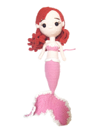 Suzie's Sunshine Dolls handmade pink crochet mermaid doll with red yarn hair and white trim tail.