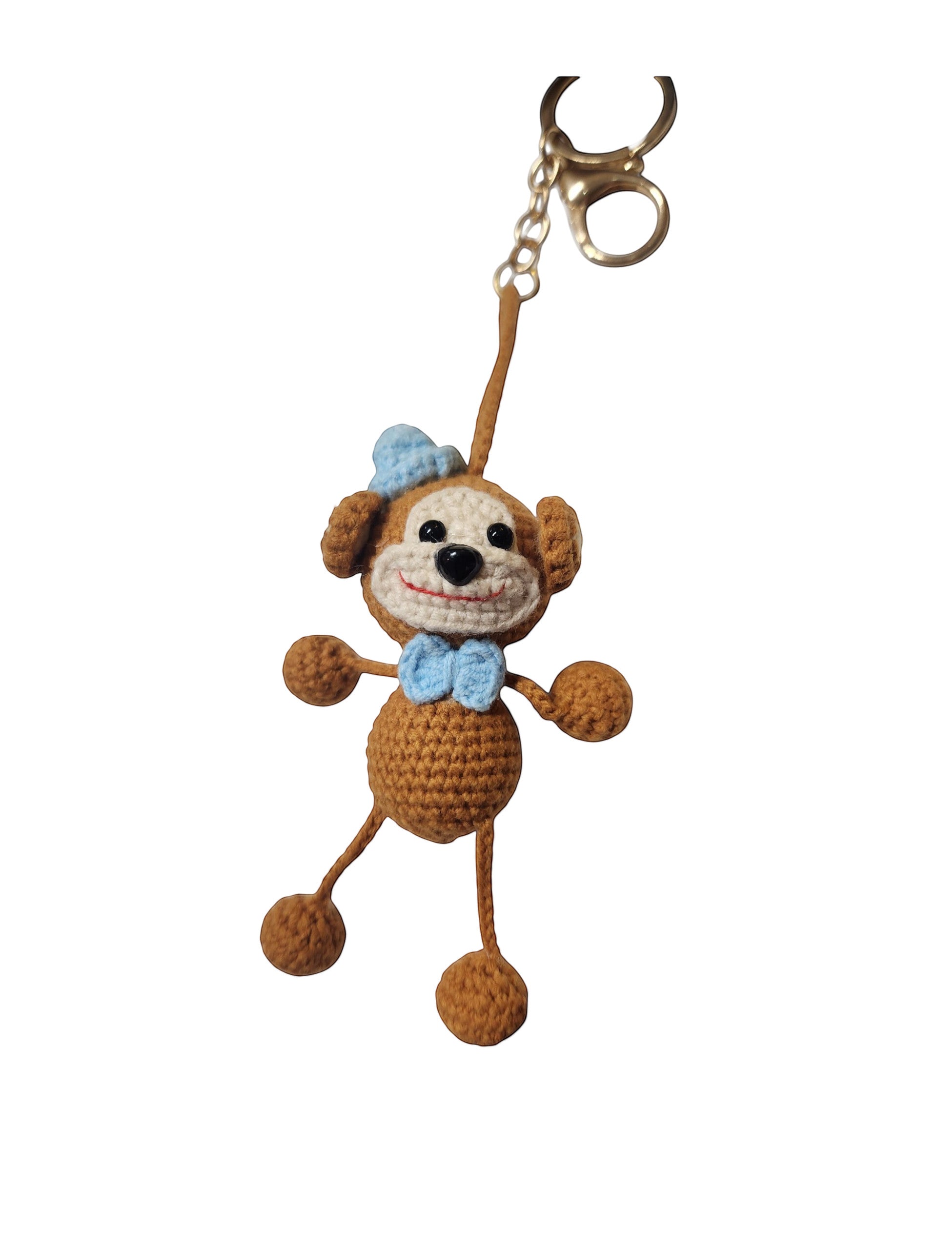 Suzie's Sunshine Dolls handmade brown crochet monkey keychain with blue bow and keyring.