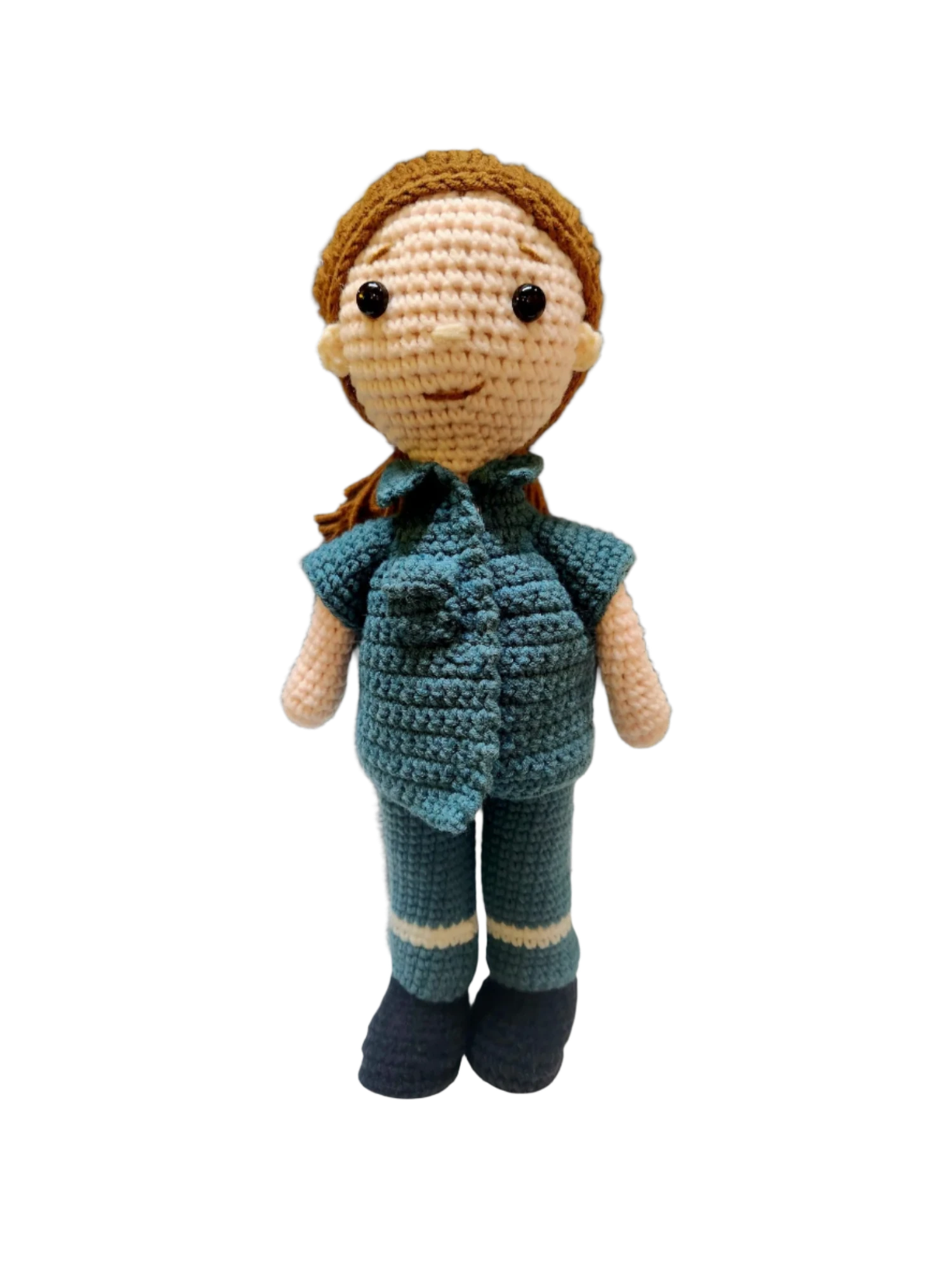 Suzie's Sunshine Dolls crochet paramedic doll in teal uniform with white stripes on legs and black boots.