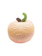Suzie's Sunshine Dolls hand-crocheted peach toy, made from soft cotton yarn in gradient pink and orange hues.