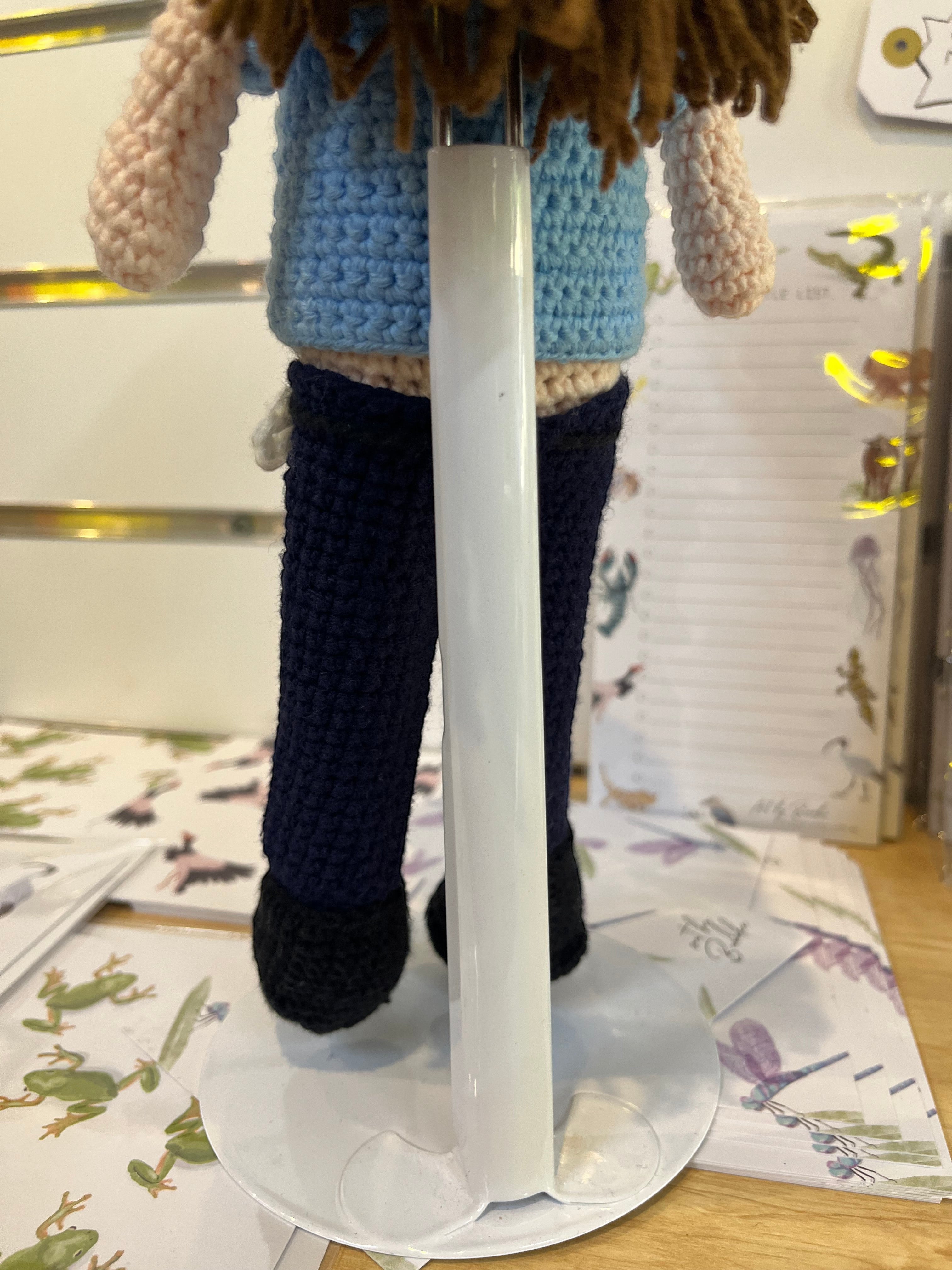Suzie's Sunshine Dolls handcrafted crochet police officer doll in blue uniform and navy pants. Approx. 28-30cm tall.