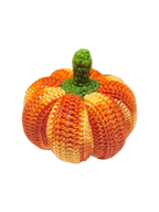 Suzie's Sunshine Dolls hand-crocheted pumpkin toy with green stem, orange and yellow variegated yarn.
