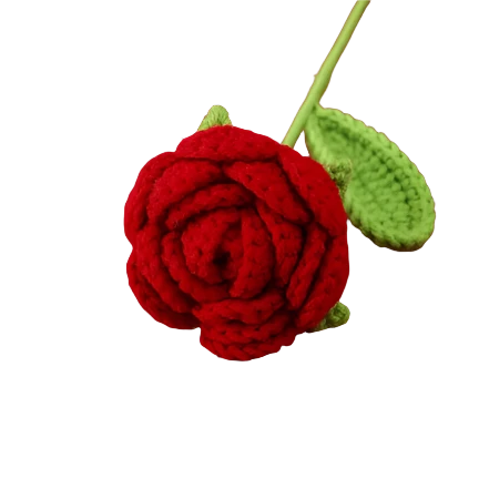 Suzie's Sunshine Dolls red crochet rose with green leaves, a timeless symbol of love and beauty.