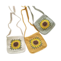 Suzie's Sunshine Dolls handmade crochet sunflower bag in white, yellow, and light green. Features a detailed sunflower motif.