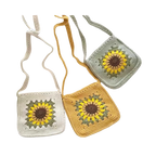 Suzie's Sunshine Dolls handmade crochet sunflower bag in white, yellow, and light green. Features a detailed sunflower motif.