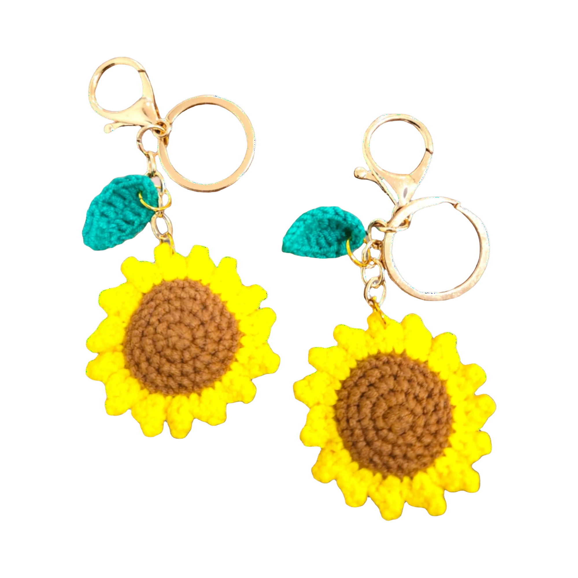 Suzie's Sunshine Dolls handmade crochet sunflower keychains with brown centers and yellow petals, featuring green leaves and gold clasps.