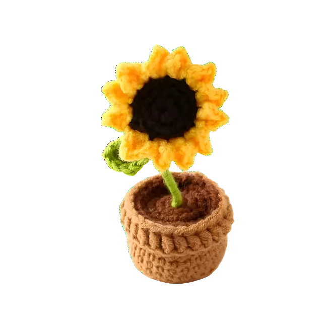 Suzie's Sunshine Dolls yellow crochet sunflower in a brown pot with green stem and leaves.