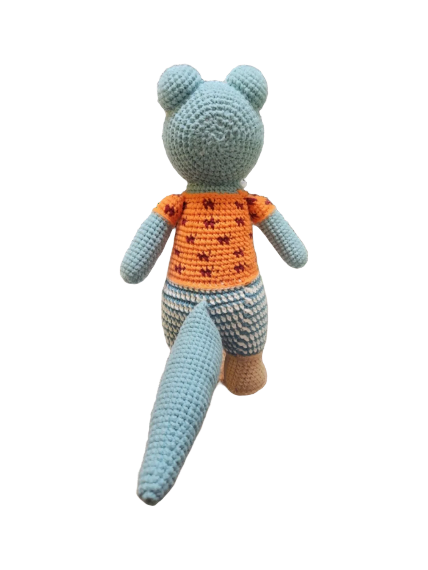 Suzie's Sunshine Dolls Calvin the Croc, a handmade crochet toy with a blue body, orange shirt, and blue & white striped pants.