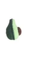 Suzie's Sunshine Dolls hand-crocheted avocado toy made of cotton yarn in light green and brown.