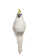 Suzie's Sunshine Dolls white crocheted cockatoo bird with yellow crest and wire feet, approx 15-18cm tall.