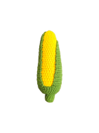 Suzie's Sunshine Dolls hand-crocheted corn cob toy made of green and yellow cotton yarn.