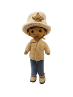 Suzie's Sunshine Dolls handmade crocheted doll dressed as a cowboy/cowgirl with a tan jacket, blue jeans, and a cream hat with a star badge.