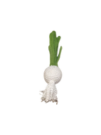 Suzie's Sunshine Dolls hand-crocheted white onion with green leaves and white roots, made of cotton yarn.