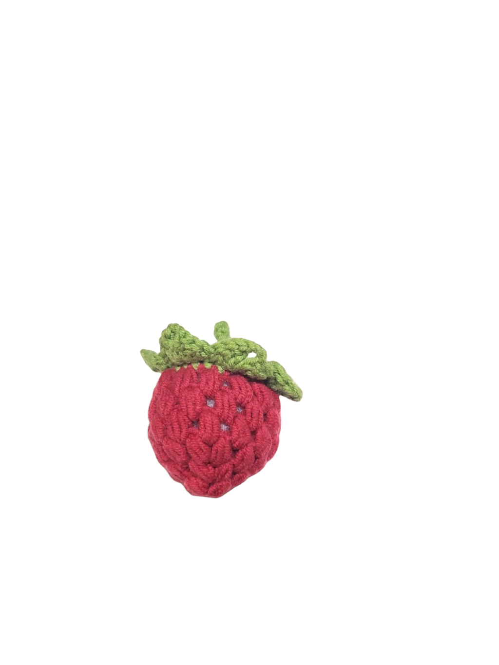 Suzie's Sunshine Dolls hand-crocheted red strawberry with green leaves, made of cotton yarn.