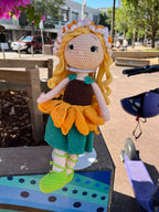 Suzie's Sunshine Dolls Daisy doll, handcrafted crochet, sunflower skirt, floral crown, green shoes, blonde yarn hair.
