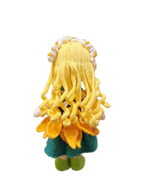 Suzie's Sunshine Dolls Daisy doll with blonde yarn hair, sunflower skirt, green dress, and yellow shoes.