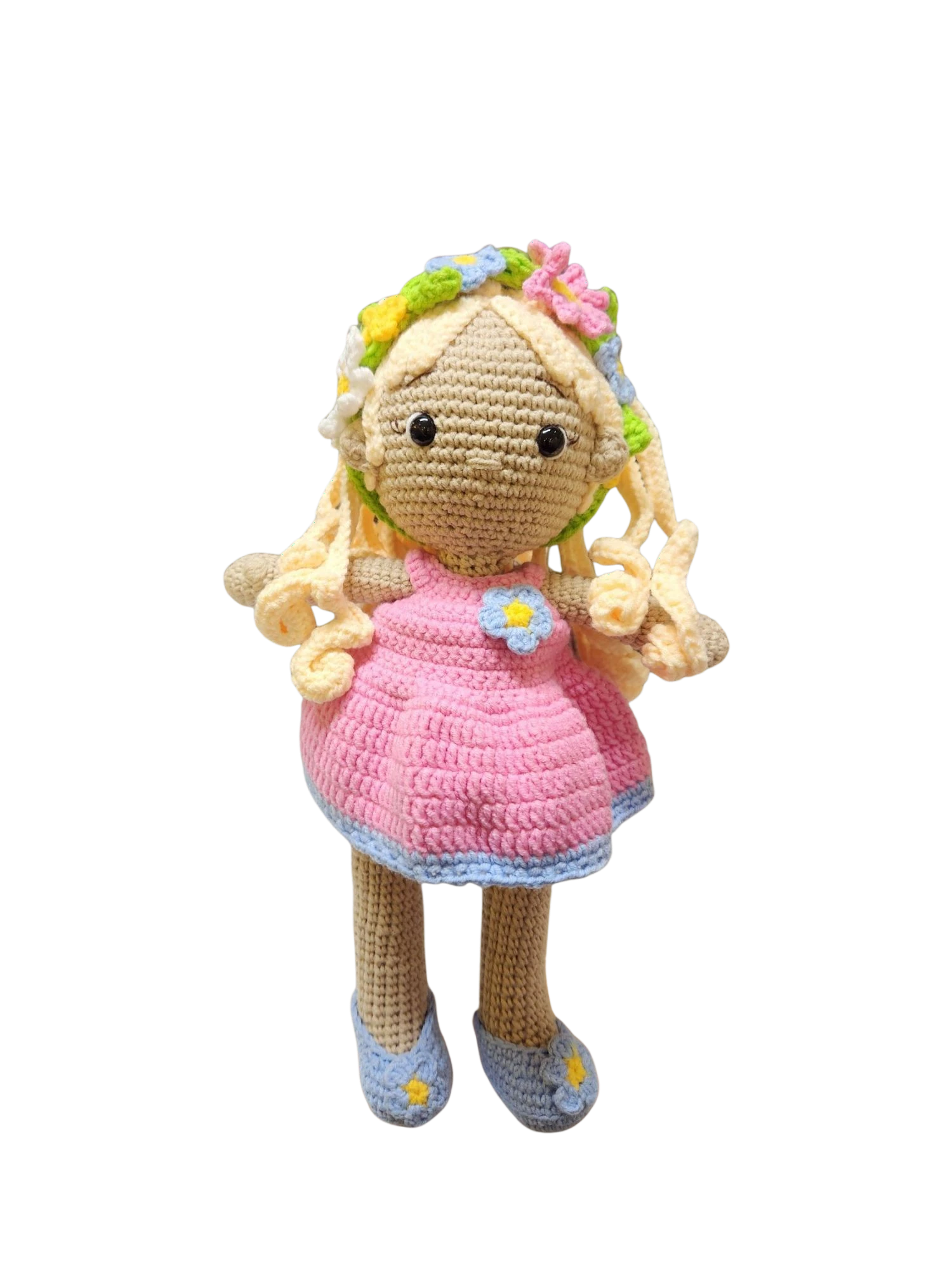 Suzie's Sunshine Dolls Delilah, a handmade crochet doll with blonde curls, pink dress, blue trim, and flower crown.