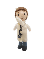 Suzie's Sunshine Dolls Doctor Doll, a crochet toy with white coat, blue pants, and stethoscope, perfect for role-play.