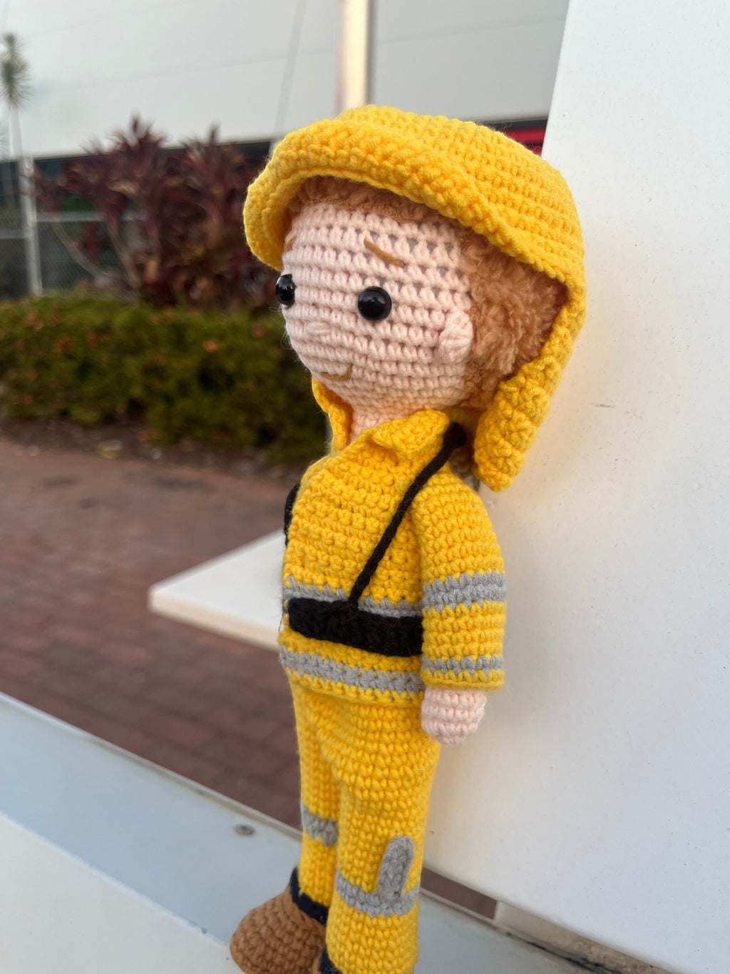 Suzie's Sunshine Dolls handmade crocheted yellow firefighter doll with reflective stripes and hood. Approx. 28-30cm.