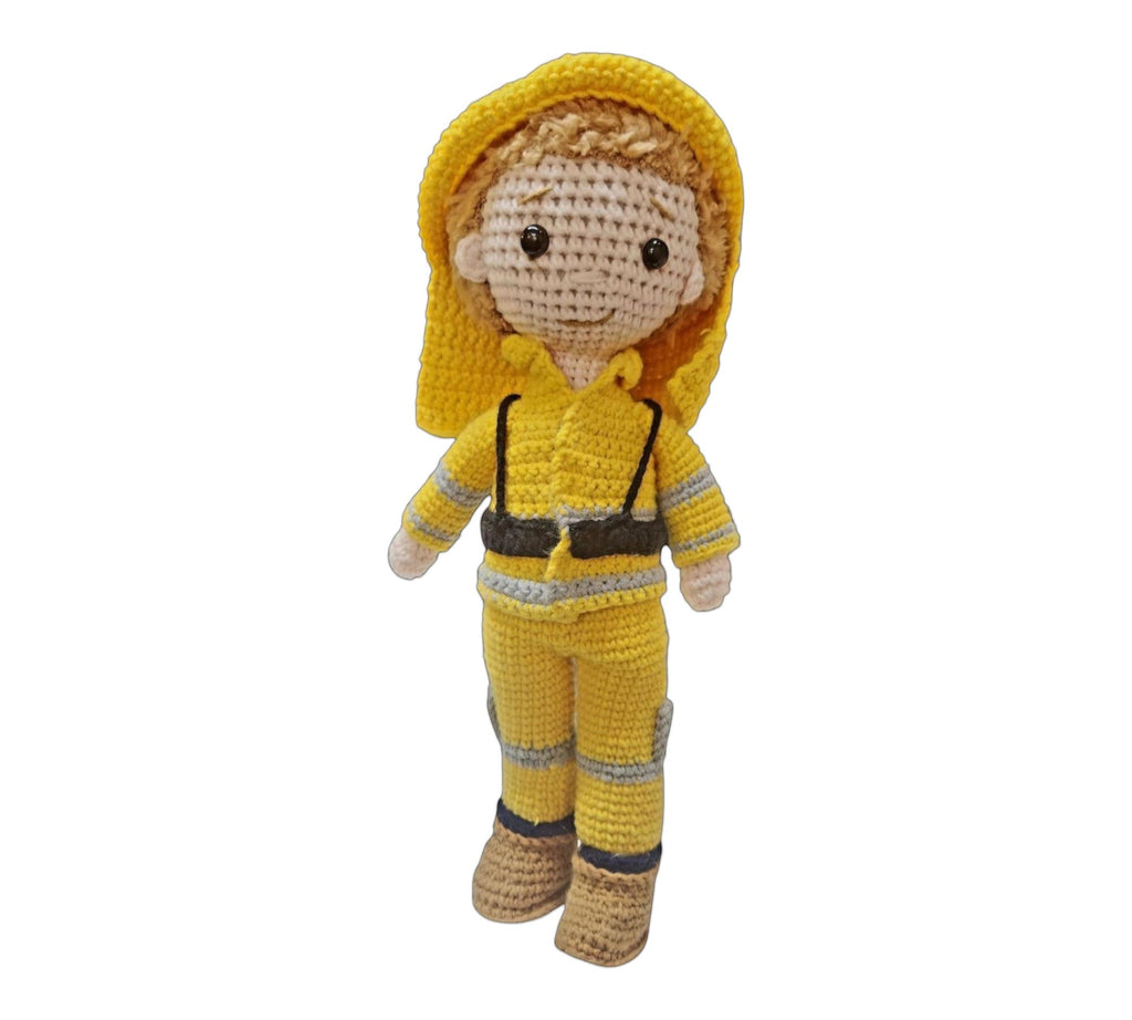 Suzie's Sunshine Dolls handmade yellow crocheted firefighter doll with detailed uniform and hood.