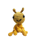 Suzie's Sunshine Dolls Gertrude the Green Ant crochet toy, golden-green yarn body, black eyes, stitched smile, antennae, approx. 10-12cm tall.
