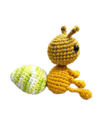 Suzie's Sunshine Dolls Gertrude the Green Ant crochet toy, yellow-green body, white & green speckled tail, black eyes, antennae.