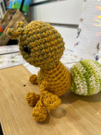 Suzie's Sunshine Dolls Gertrude the Green Ant crochet toy, yellow-green yarn, stitched smile, antennae, 10-12cm tall