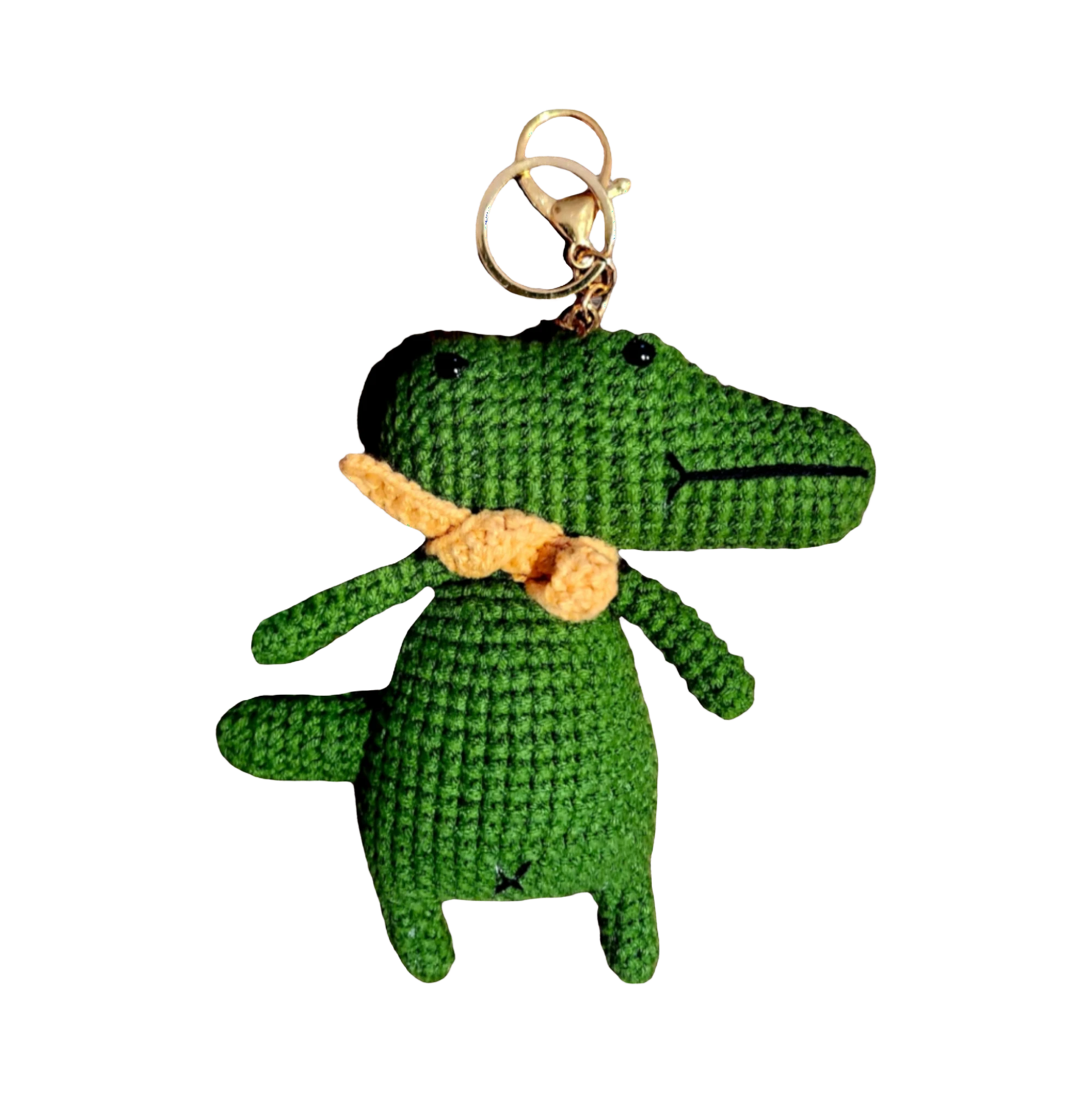 Suzie's Sunshine Dolls green crochet alligator keychain with orange scarf and gold keyring.