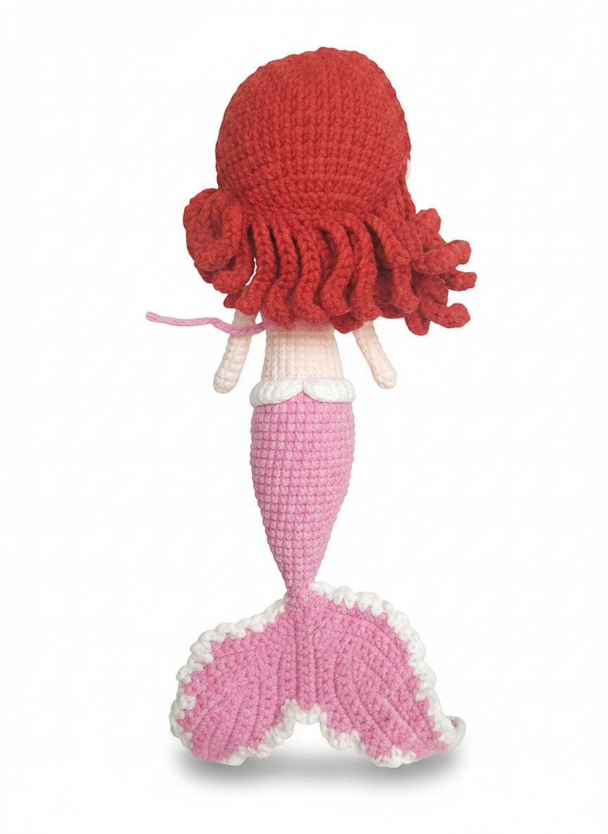 Suzie's Sunshine Dolls handmade crochet mermaid doll with red yarn hair and pink tail with white trim.