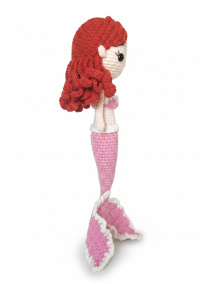 Suzie's Sunshine Dolls handmade crochet mermaid doll with red yarn hair and pink tail.
