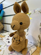 Suzie's Sunshine Dolls Kirsty the Kangaroo, a handmade brown crochet toy with joey in pouch. Approx 22-25cm.