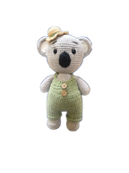 Suzie's Sunshine Dolls Kolby the Koala, a grey crocheted stuffed animal wearing green overalls and a straw hat.