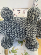 Suzie's Sunshine Dolls Kurtis the Croc, a handmade grey plush crocodile toy with white toes and stitched smile.